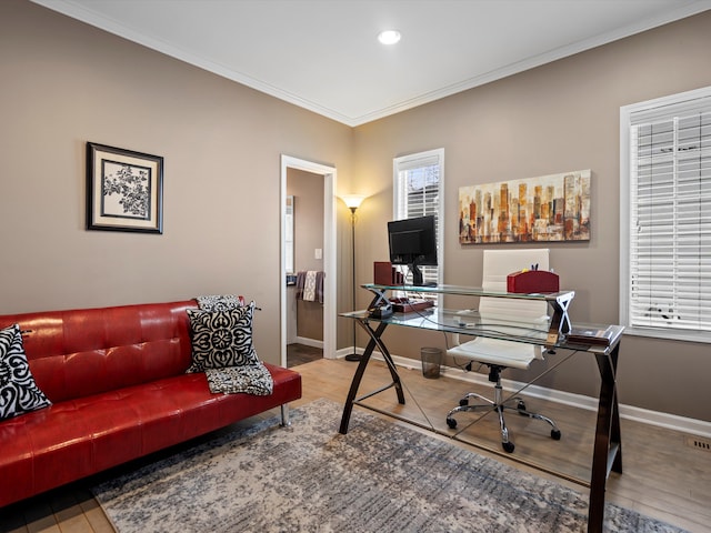 office space featuring recessed lighting, crown molding, baseboards, and wood finished floors