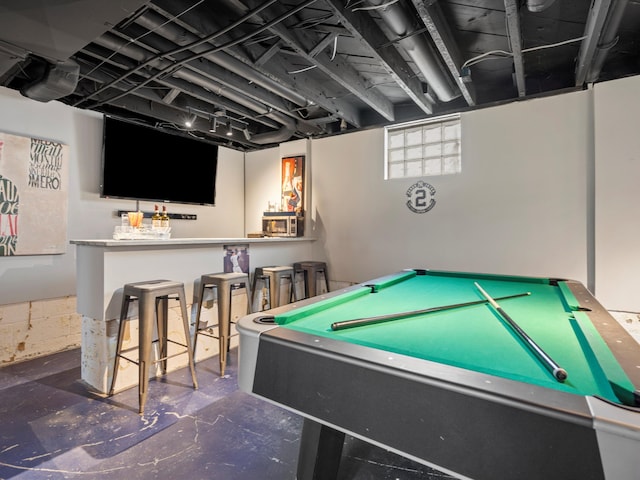 game room with pool table and concrete floors