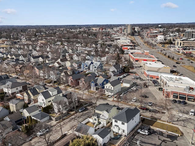 birds eye view of property with a residential view