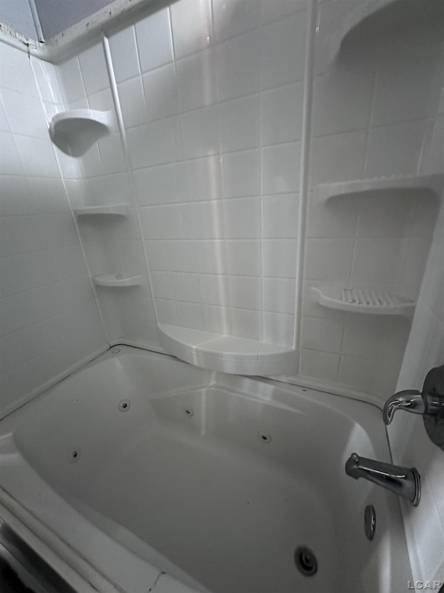 bathroom featuring a combined bath / shower with jetted tub