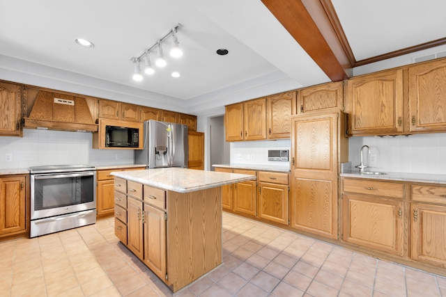 kitchen featuring a center island, stainless steel appliances, light countertops, custom range hood, and a sink