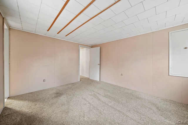 unfurnished room with carpet floors