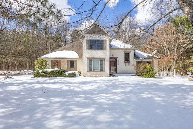 view of front of house with fence