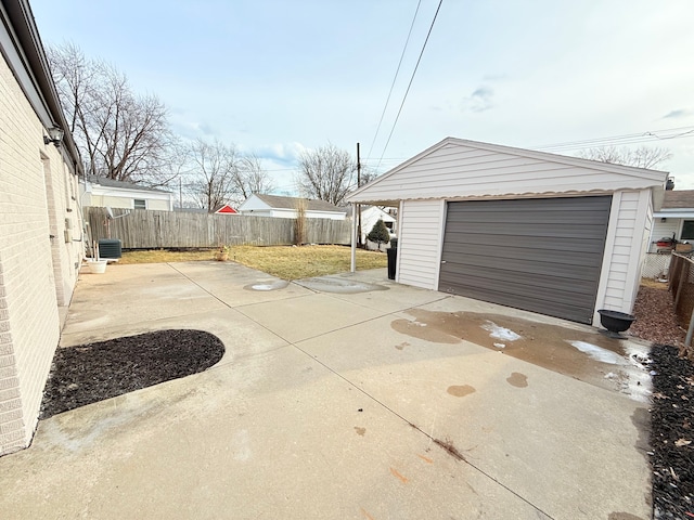 exterior space featuring driveway and fence