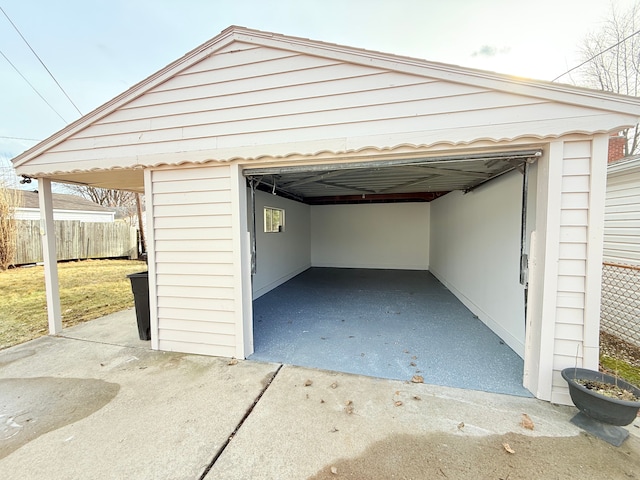 garage with fence