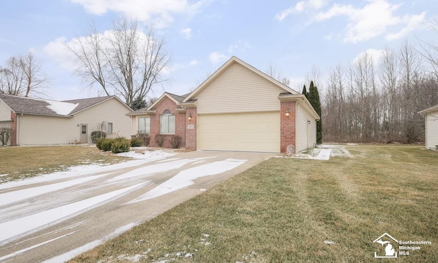 single story home featuring an attached garage, a front yard, concrete driveway, and brick siding