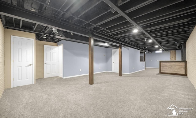 finished below grade area featuring carpet floors