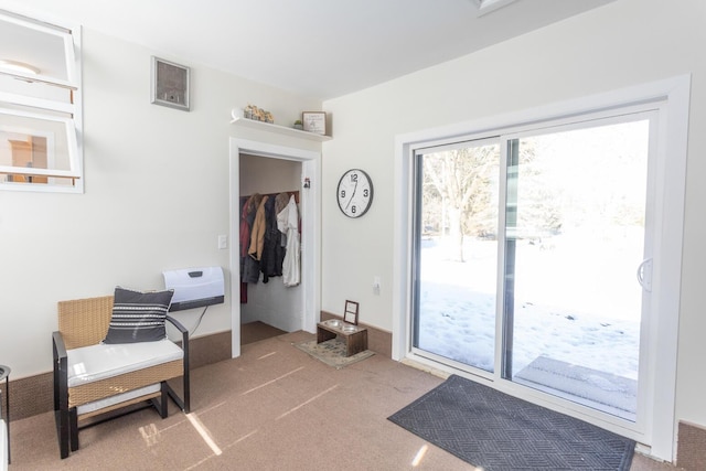 doorway featuring carpet flooring and visible vents