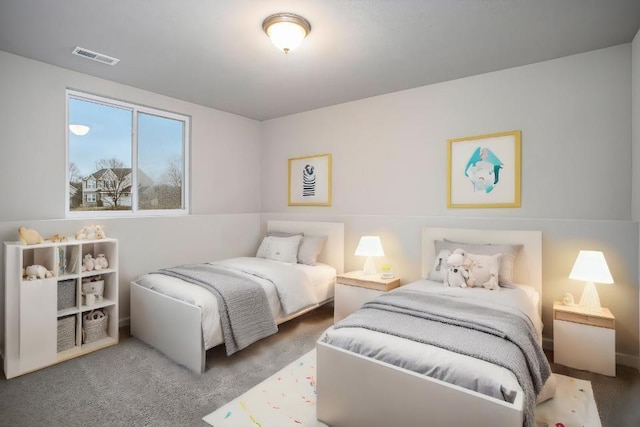 bedroom featuring carpet and visible vents