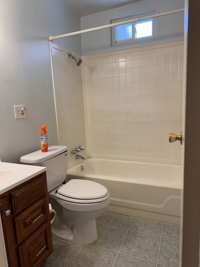 full bathroom with  shower combination, vanity, toilet, and tile patterned floors