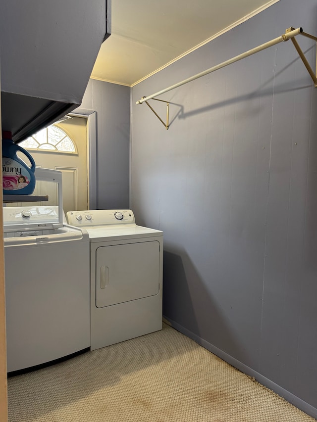 washroom with laundry area, light colored carpet, and independent washer and dryer