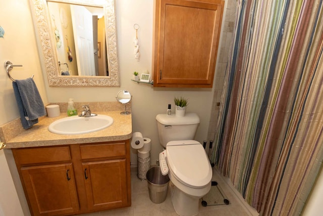 bathroom featuring tile patterned flooring, a shower with shower curtain, vanity, and toilet