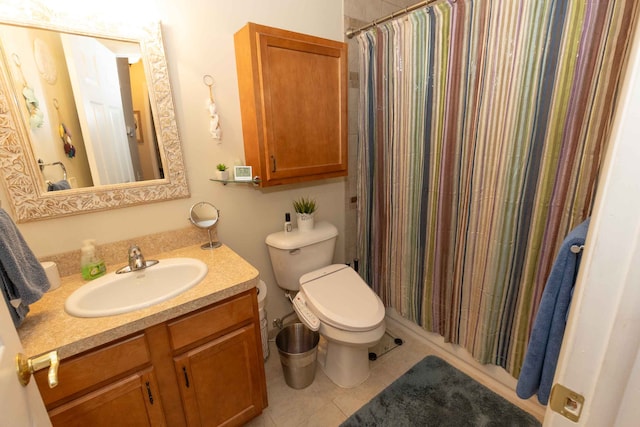 full bath featuring a shower with shower curtain, vanity, toilet, and tile patterned floors