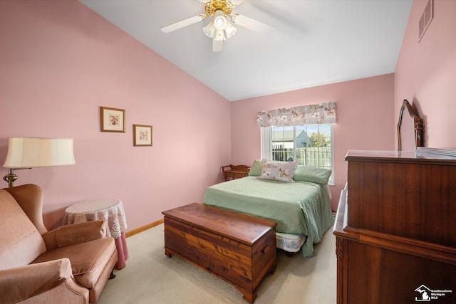 bedroom featuring baseboards, visible vents, a ceiling fan, light colored carpet, and lofted ceiling