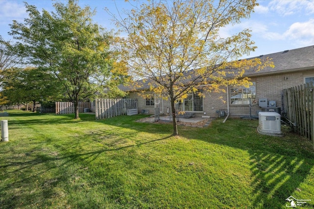 view of yard featuring a patio area and fence