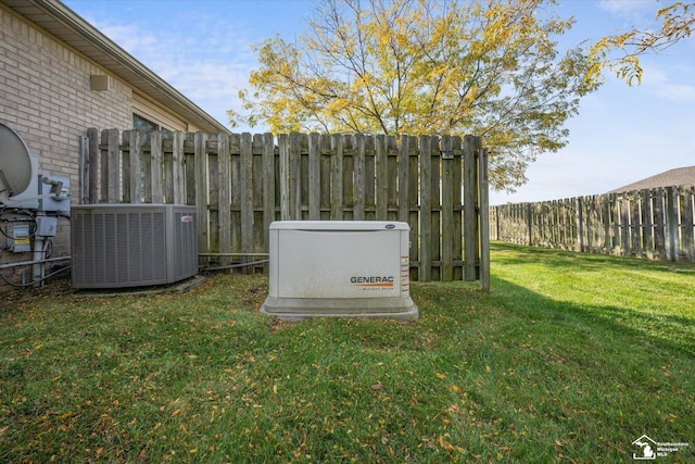 exterior details with brick siding, fence, a power unit, and central air condition unit