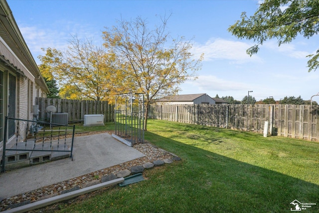 view of yard featuring a fenced backyard and a patio