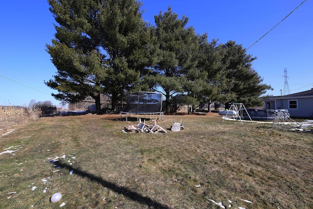 view of yard featuring a trampoline