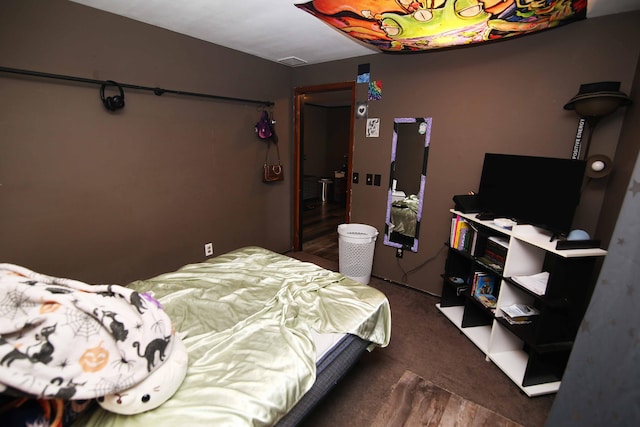 bedroom with carpet flooring and visible vents