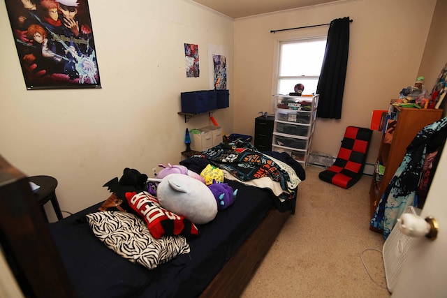 bedroom with a baseboard radiator