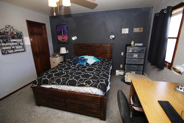 carpeted bedroom with a ceiling fan, baseboards, and baseboard heating