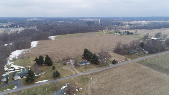 birds eye view of property with a rural view