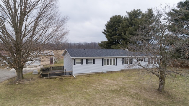 ranch-style house with a front yard