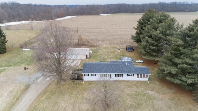 aerial view featuring a rural view and a view of trees