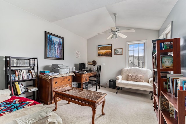 office area featuring lofted ceiling, ceiling fan, and carpet flooring