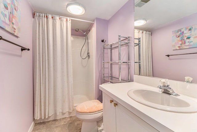 full bathroom with vanity and toilet