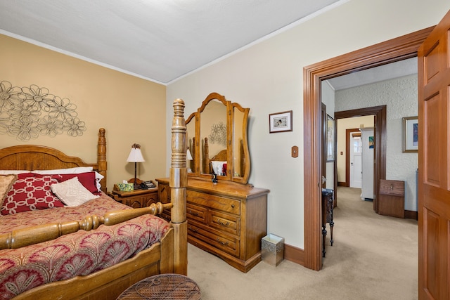 bedroom featuring light carpet, ornamental molding, and baseboards