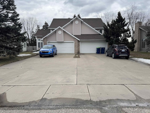 view of side of property with driveway