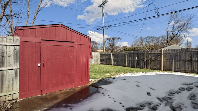 view of shed featuring a fenced backyard