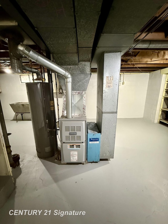 utility room with water heater