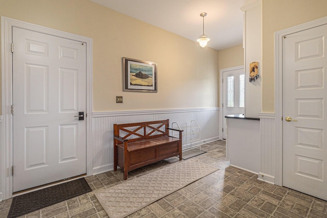 entryway featuring wainscoting