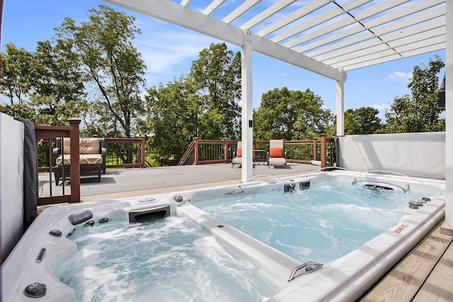 view of swimming pool with a deck, a covered hot tub, and a pergola