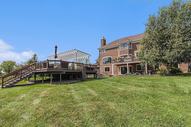 rear view of property featuring brick siding, a yard, a chimney, stairway, and a pergola