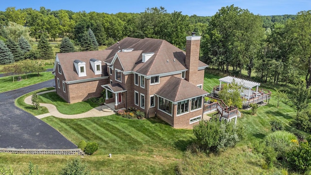 aerial view with a wooded view