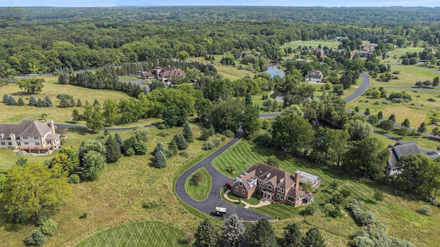 drone / aerial view with a view of trees