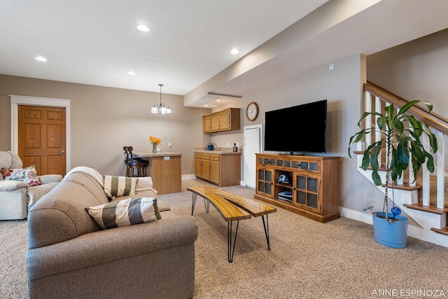 living room with baseboards, stairs, light colored carpet, and recessed lighting