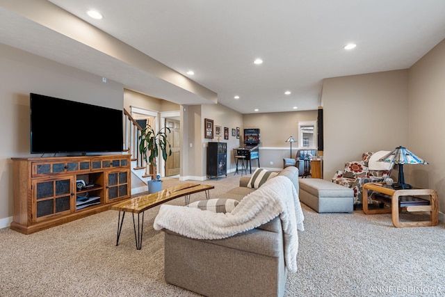 carpeted living room with baseboards, stairway, and recessed lighting