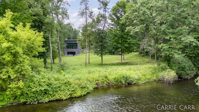 exterior space with a water view