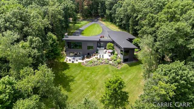 aerial view with a wooded view