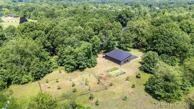 aerial view with a wooded view