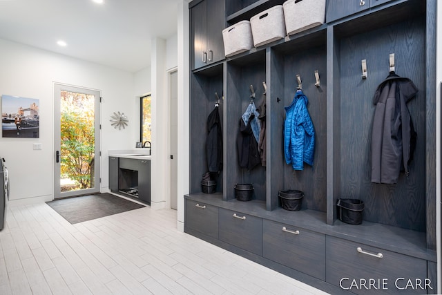 mudroom featuring recessed lighting and wood finished floors