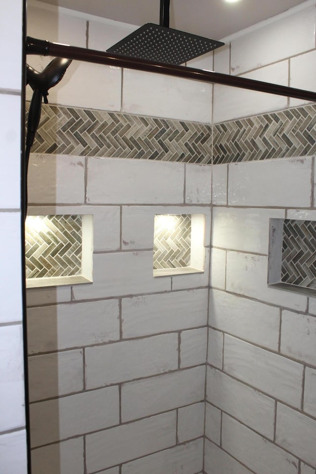 interior space featuring a tile shower