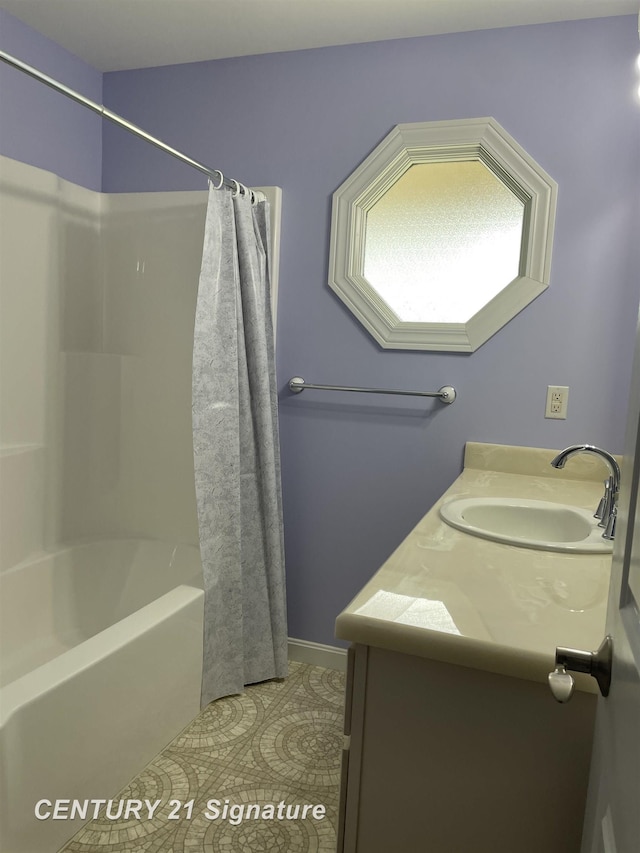 bathroom with tile patterned flooring, vanity, and shower / tub combo with curtain