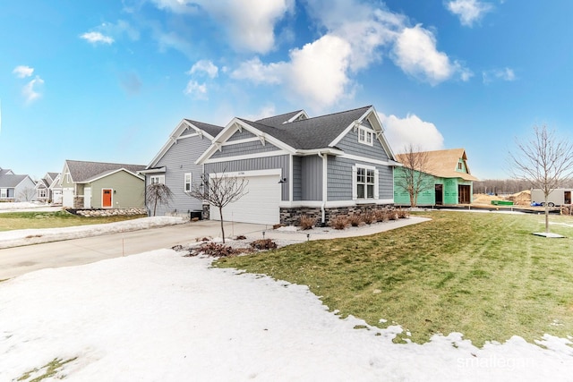 view of front of house featuring concrete driveway, board and batten siding, a garage, stone siding, and a front lawn