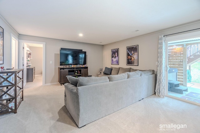 living room featuring light carpet and baseboards