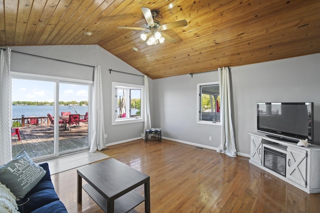 living area with wooden ceiling, baseboards, vaulted ceiling, and wood finished floors